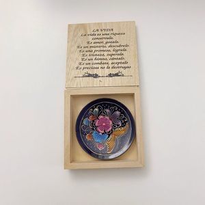 Little cute wood box with a small plate inside
